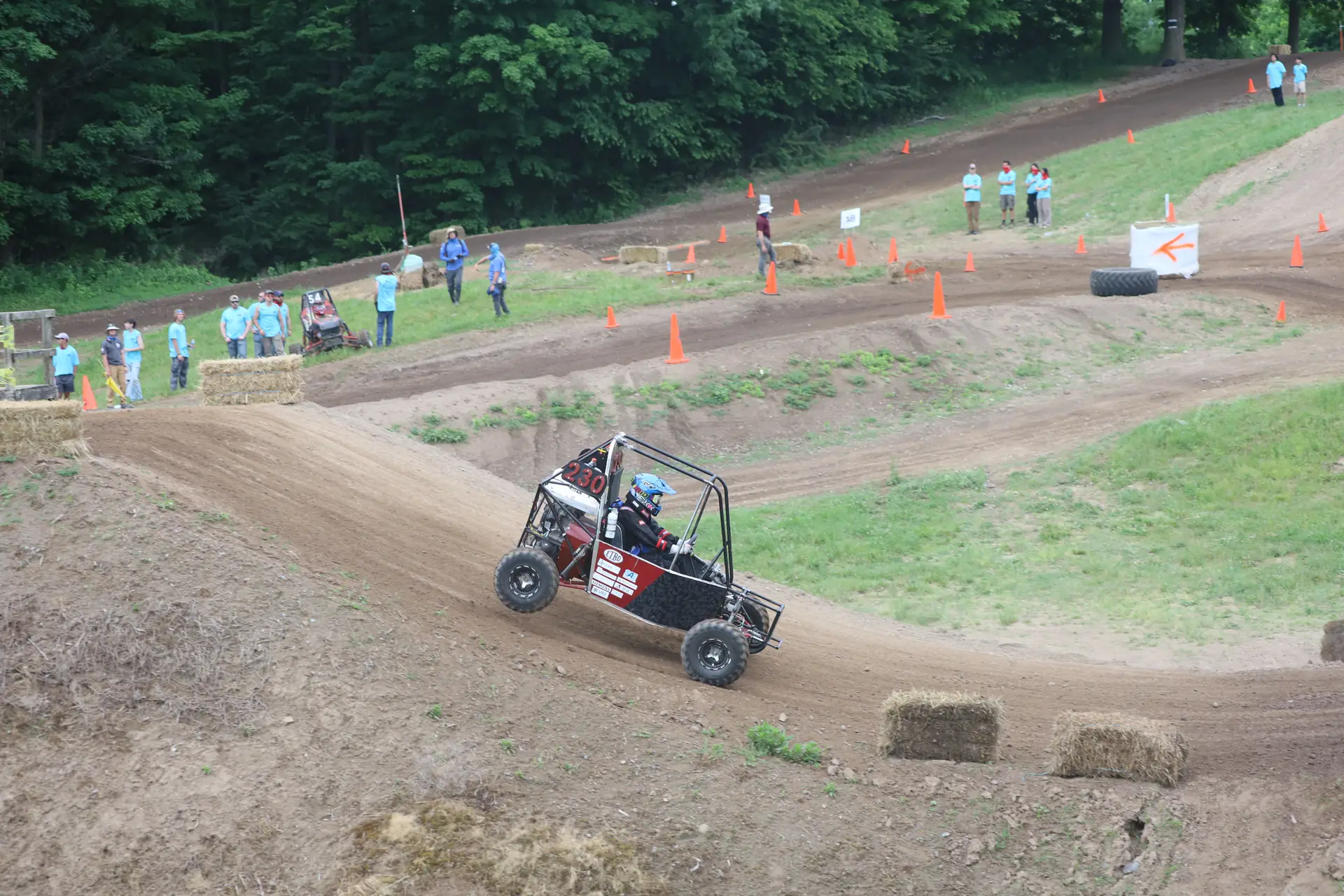 Car descending a dirt hill