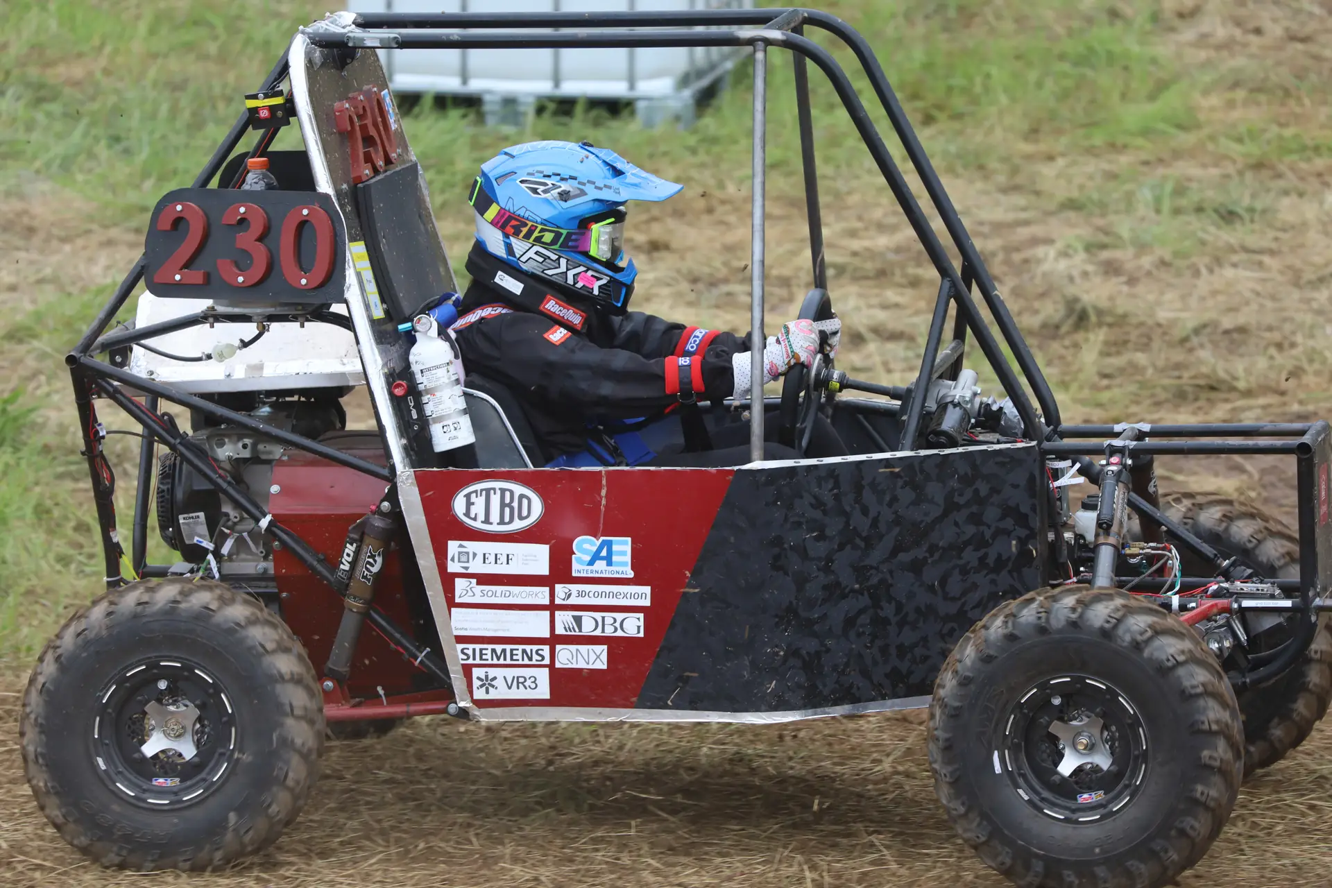 Rough Rider Racing car #230 on course at competition