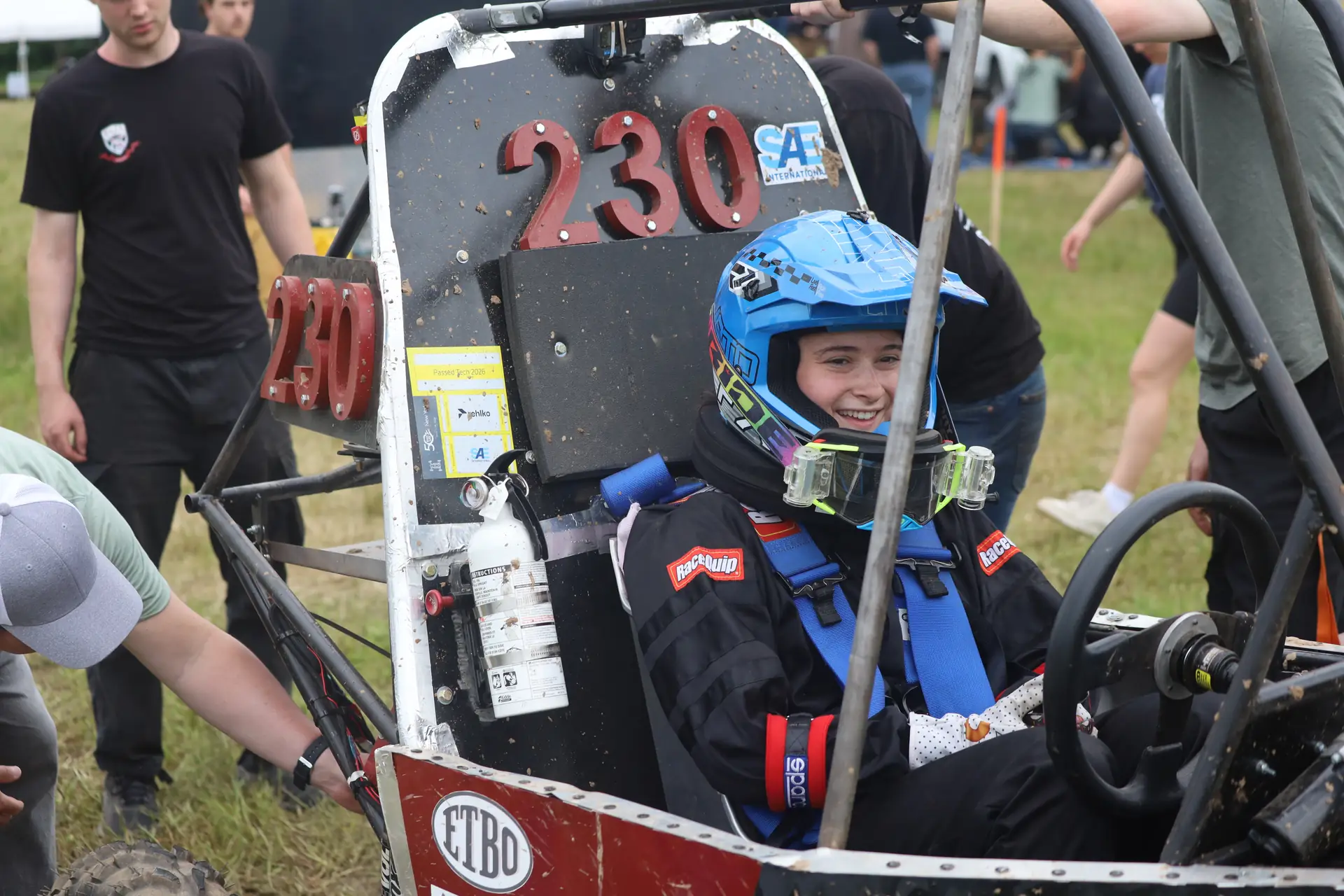 Driver strapped into the cockpit